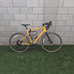 2025 CANNONDALE TOPSTONE 4  GRAVEL BIKE N MANGO COLOR. $1000 or trade for Ebike