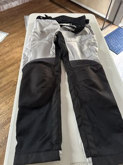 Motorcycle protective cold weather pants with rain insert