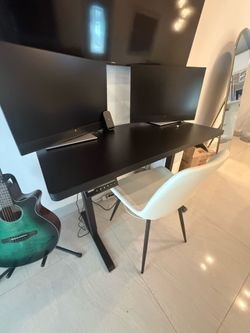 Black Electric desk with chair