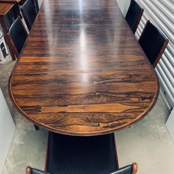 Stunning rosewood 1960s Danish MCM extendable dining table by Arne Vodder