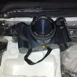 Camera And Bag And Tripod Etc.