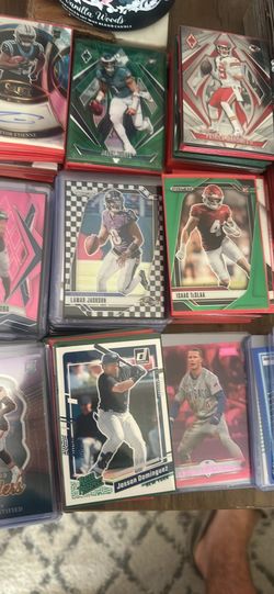 400$ bulk 5-50$ numbered, rookies, holos. All sports mainly football