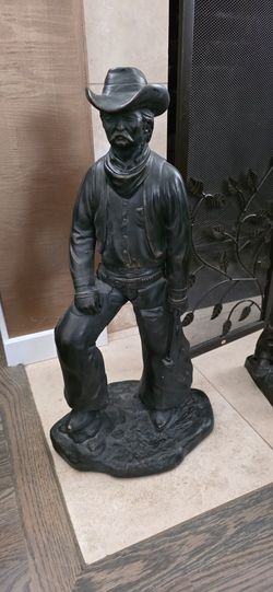 Vintage  Signed  Bronze Tone Ceramic Cowboy Figurine .
21&quot;