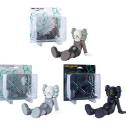 KAWS Holiday Taipei Vinyl Figure Set
• Brown/Black/Grey