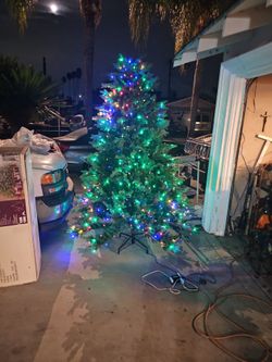 Arbol  de Navida  7.5  como   nuevo  todo  le  trabaja