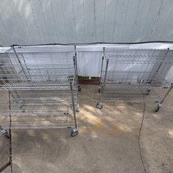  3-tier wire shelving unit with wheels. TAKE ALL 3 FOR 200$