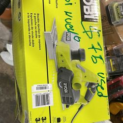 Handheld electric planer