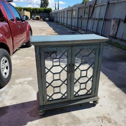 2-Door Console Table in a weathered gray finish