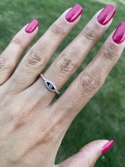 Unique custom made evil eye rose gold and diamond ring.