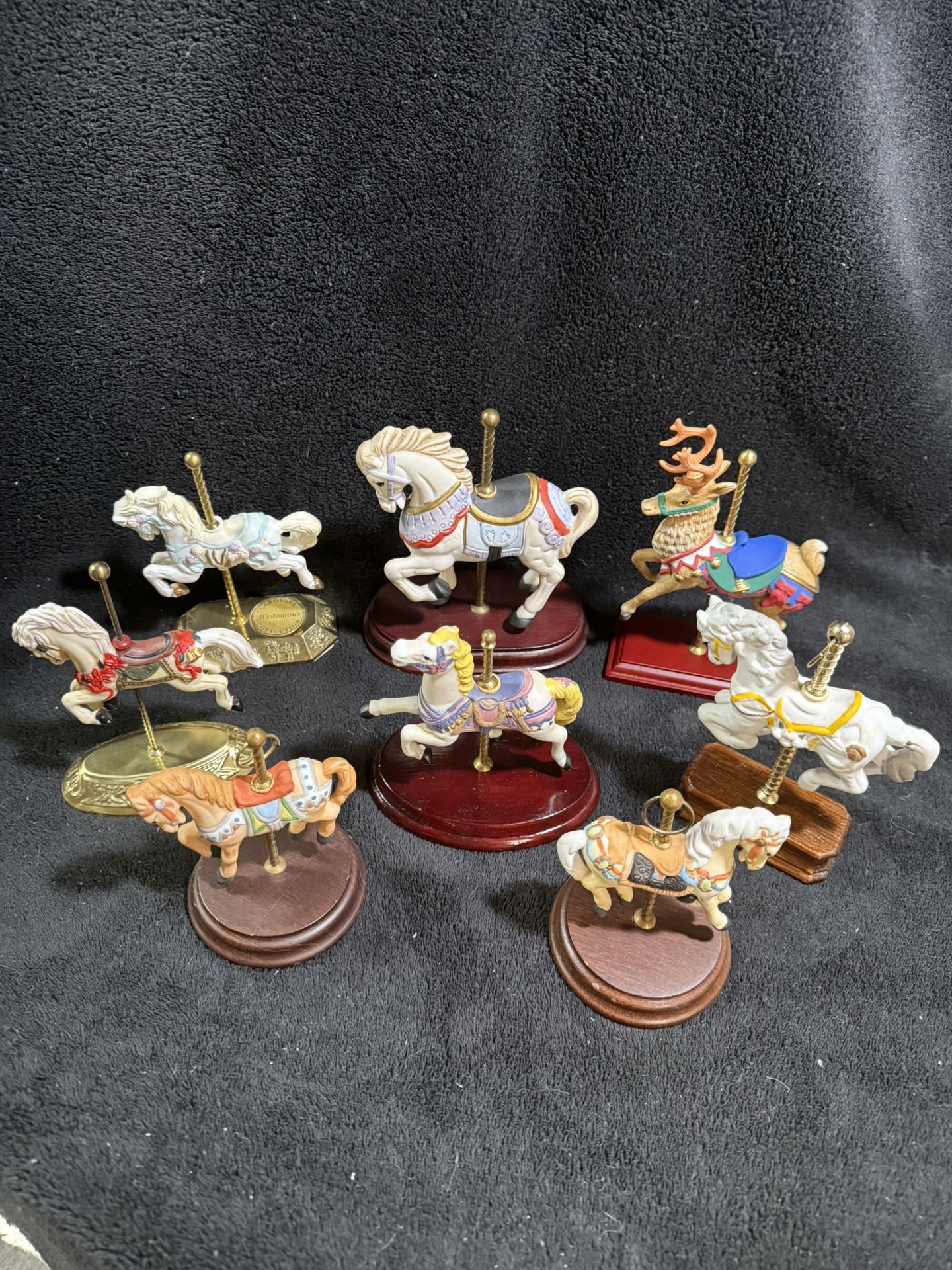 8 Various Porcelain Carousel Horses And A Reindeer 