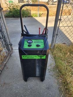 Cargador de batería y para pasar el corriente