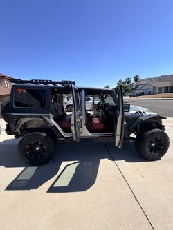 2015 Jeep Wrangler Unlimited Sport 4x4 – Clean Title – Fully Upgraded