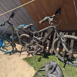 2 Mountain Bikes One 27" And Other 29"