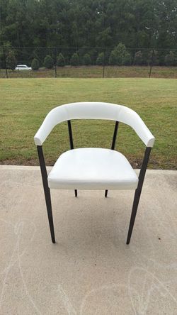 4 white chairs