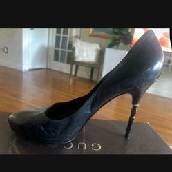 GUCCI authentic black leather/size 10/only worn twice