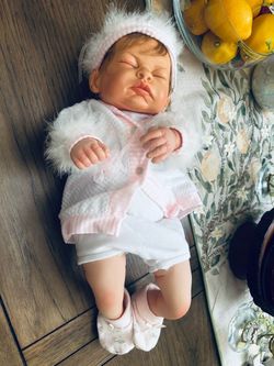 Realistic baby doll