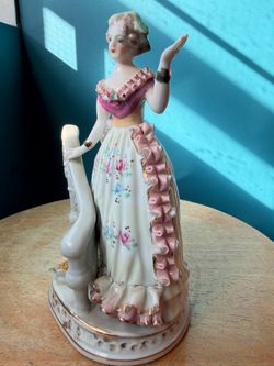 Vintage Lady Standing by Balustrade