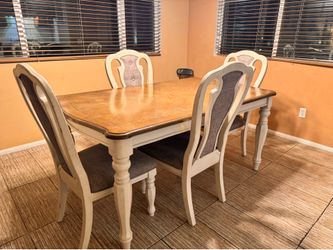 Dining table with a four chair, $50