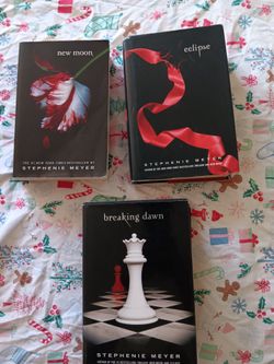 New Moon, Eclipse, and Breaking Dawn by Stephanie Meyer