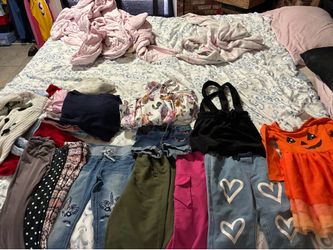 4-5 T-shirt’s and pants all for 20$