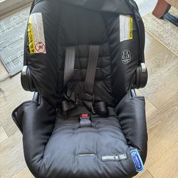Infant Graco Car seat and Walker With Toys In Great Condition 