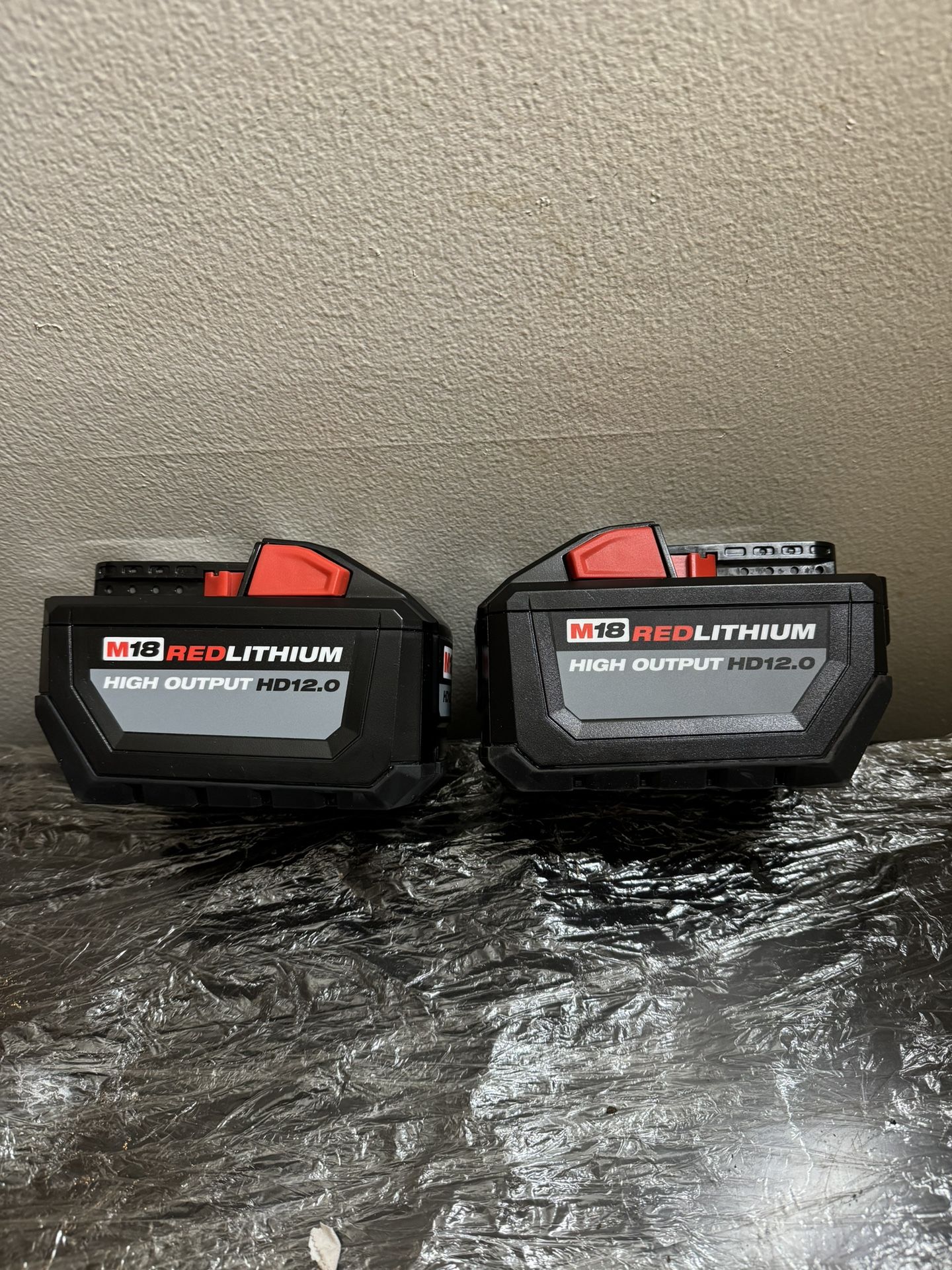 Two Milwaukee 18V High Output 12 hr Batteries