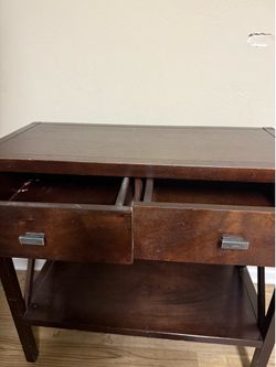 Cute wooden stand. Selling as is.