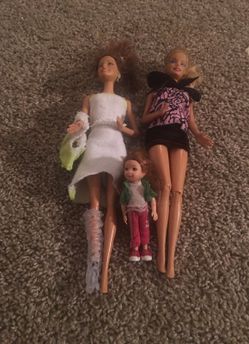 3 barbie dolls