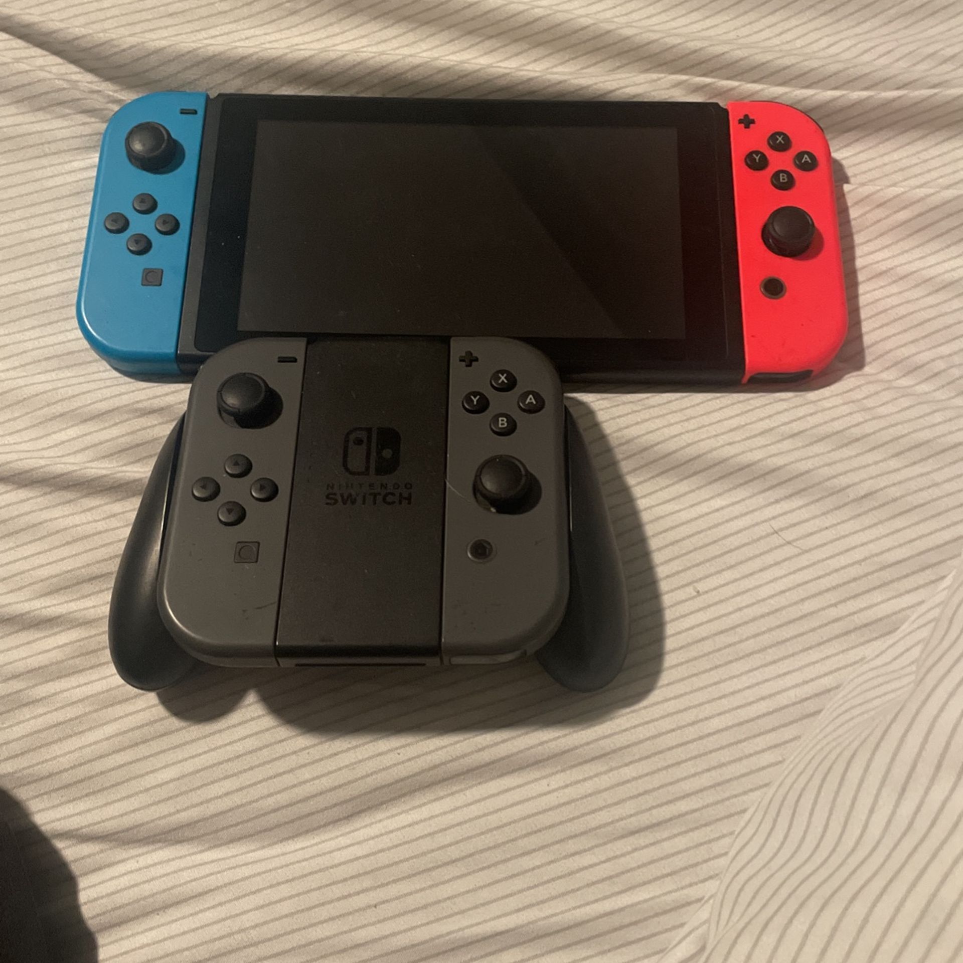 Nintendo Switch + Controllers And Extra Joy cons