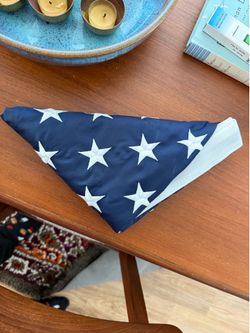 American flag folded by Marines-