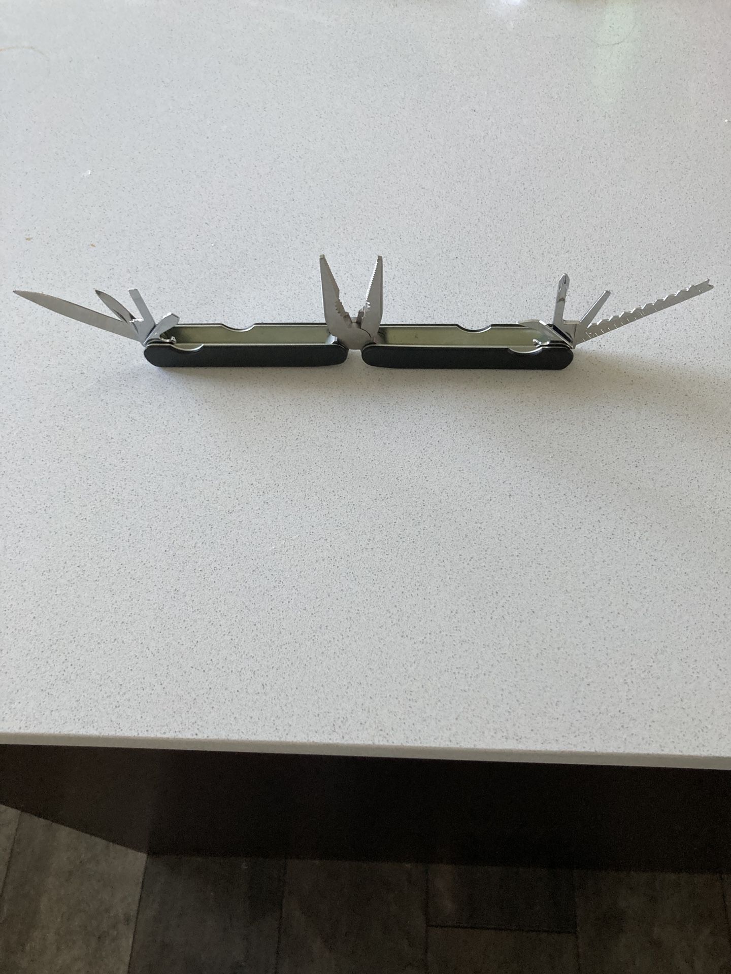 Used 9-in-1 Multi Tool With Holder