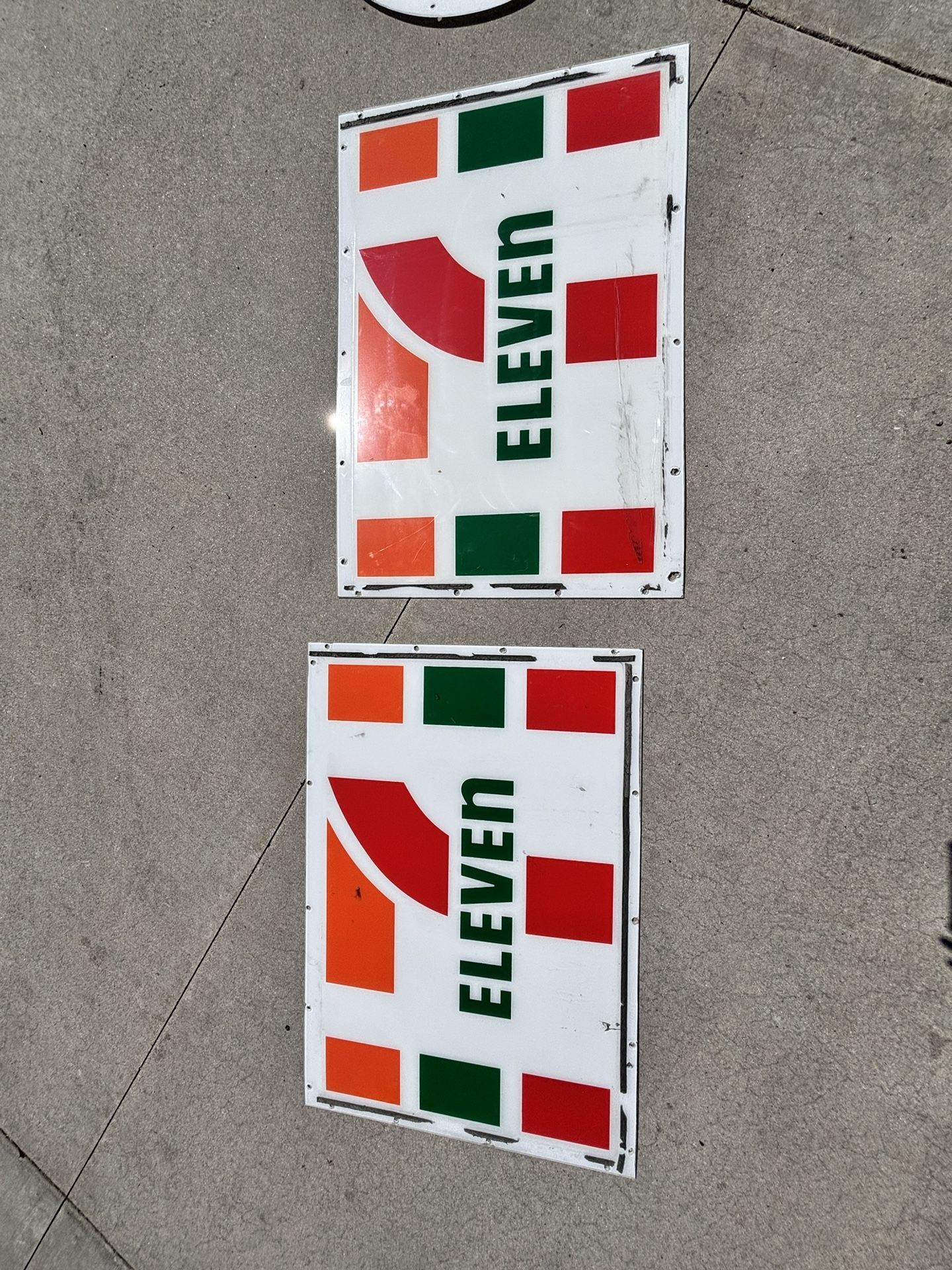 Two 7/11 Signs
