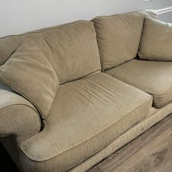 Beige Love Seat And Matching Chair And Pillows 