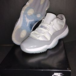Cement grey Jordan 11 low's size 8.5 Mens