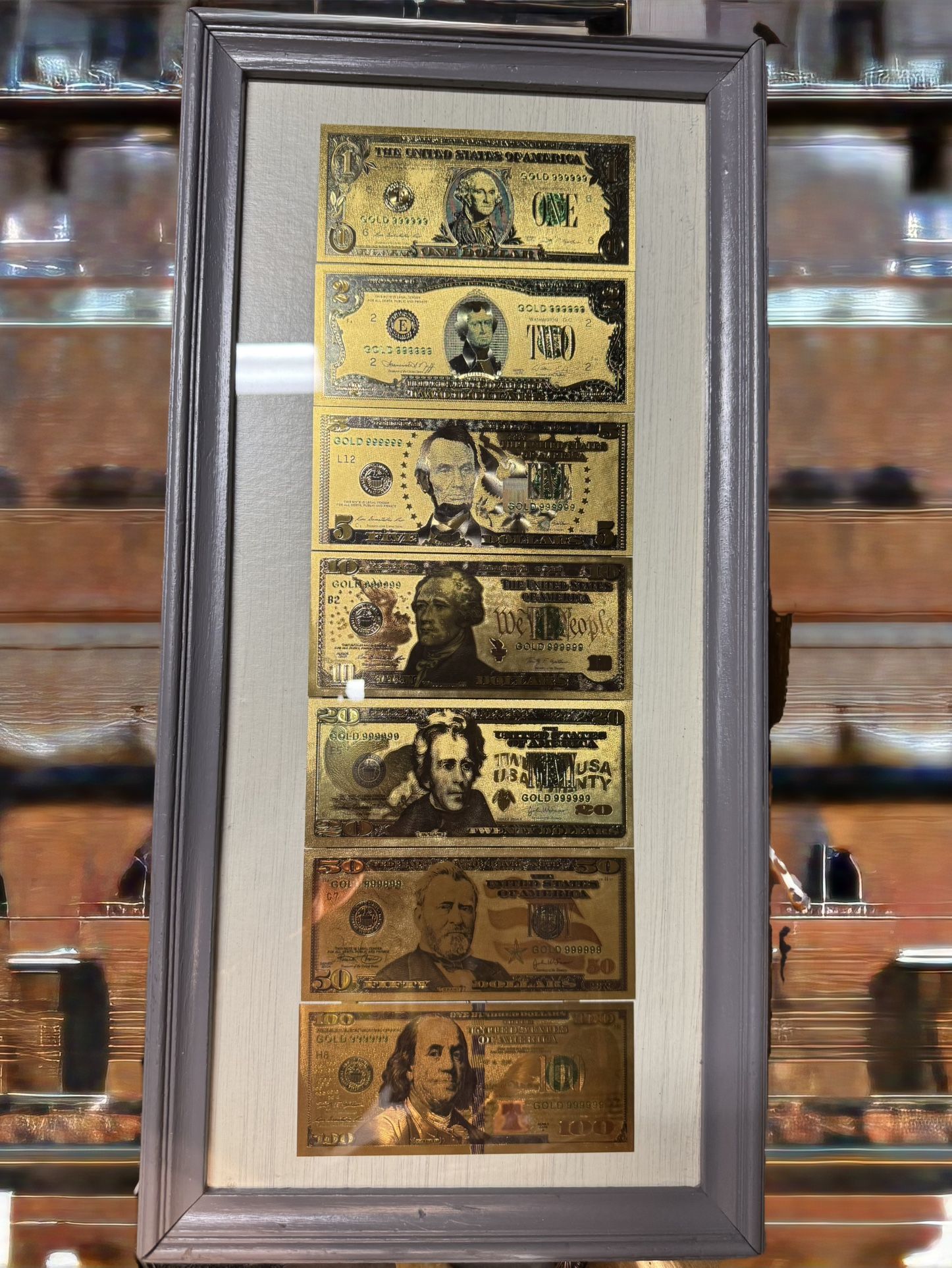 Gold Foil Of American Dollars In A Frame. 40.00