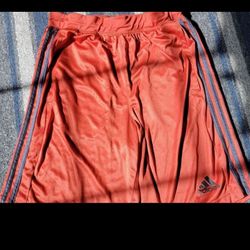 Red adidas shorts