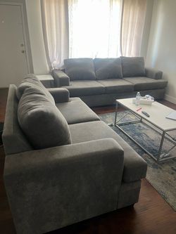 Grey loveseat and sofa must be bought together