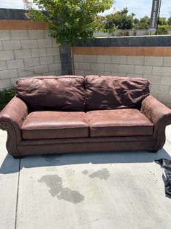 Brown leather couches