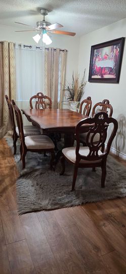 8 chairs and table dinner room set.