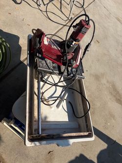an MK Diamond MK-370EXP 7-inch Wet Tile Saw