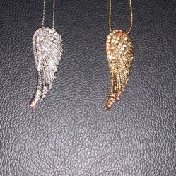 SOLITAIRE ANGEL WING WITH CLEAR STONES