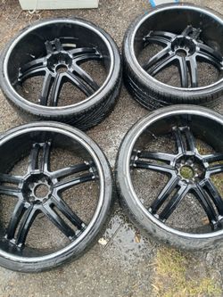 4 24 inch rims Universal 3 tires have decent tread