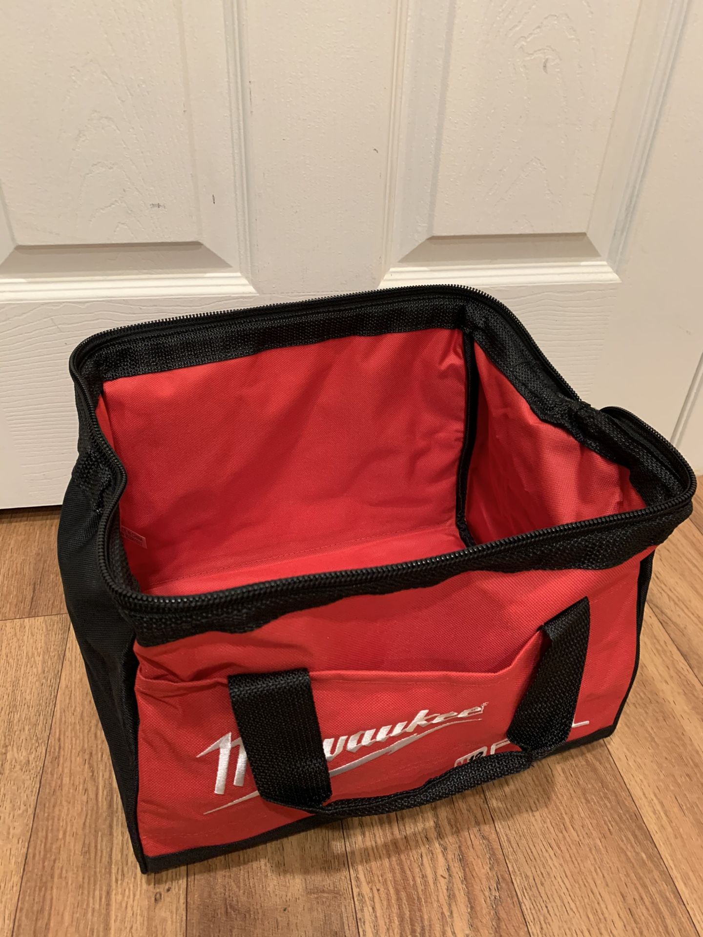 Milwaukee medium size tool bag. $20 firm