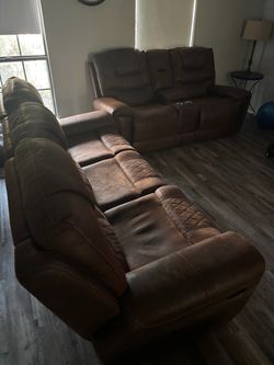 Brown Reclining Sofa and Loveseat Set