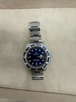 Rolex submariner with sapphires and diamonds
