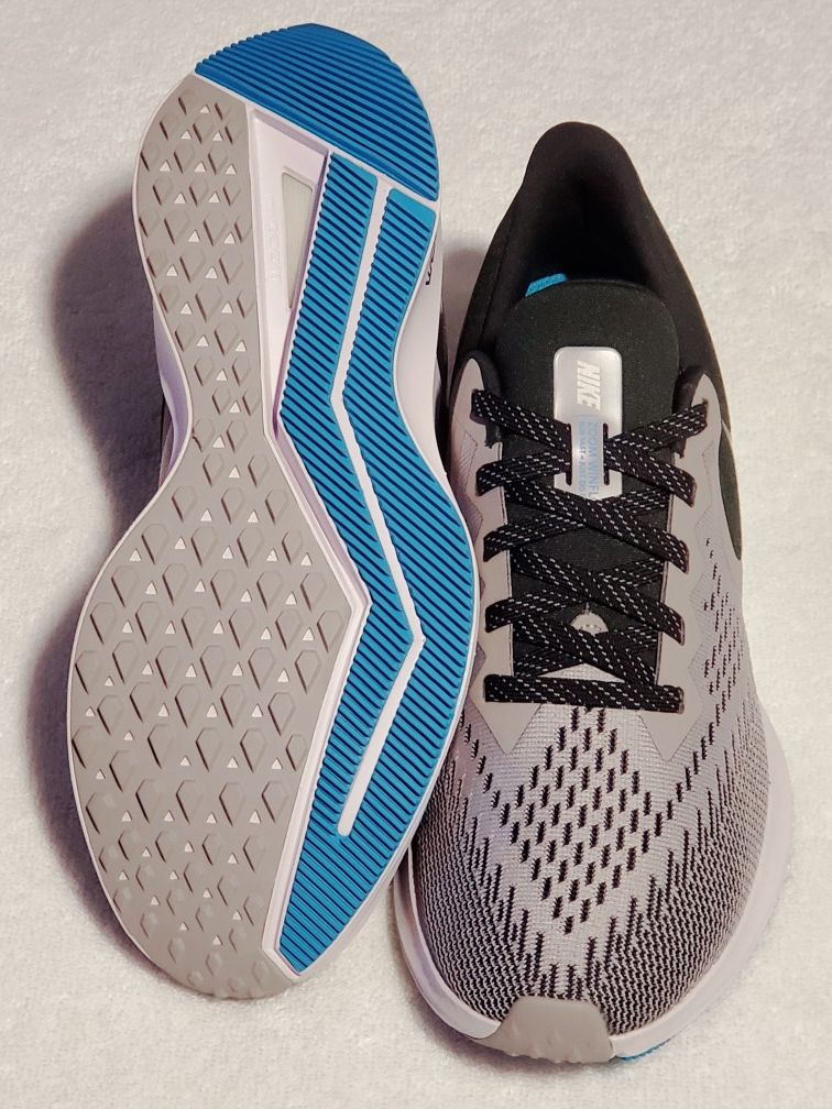 MEN'S SIZE WOMEN'S SIZE 9: NIKE ZOOM RUNNING SHOES!!