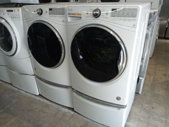 Whirlpool front load washer and dryer set on pedestals - Free delivery