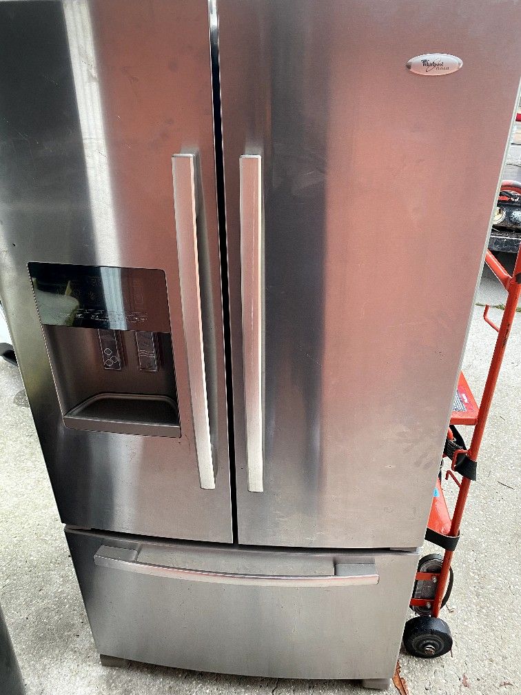 Whirlpool Gold French door stainless ice and water fridge works perfect with warranty