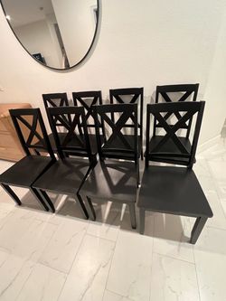 8 Beautiful black wooden dining chairs