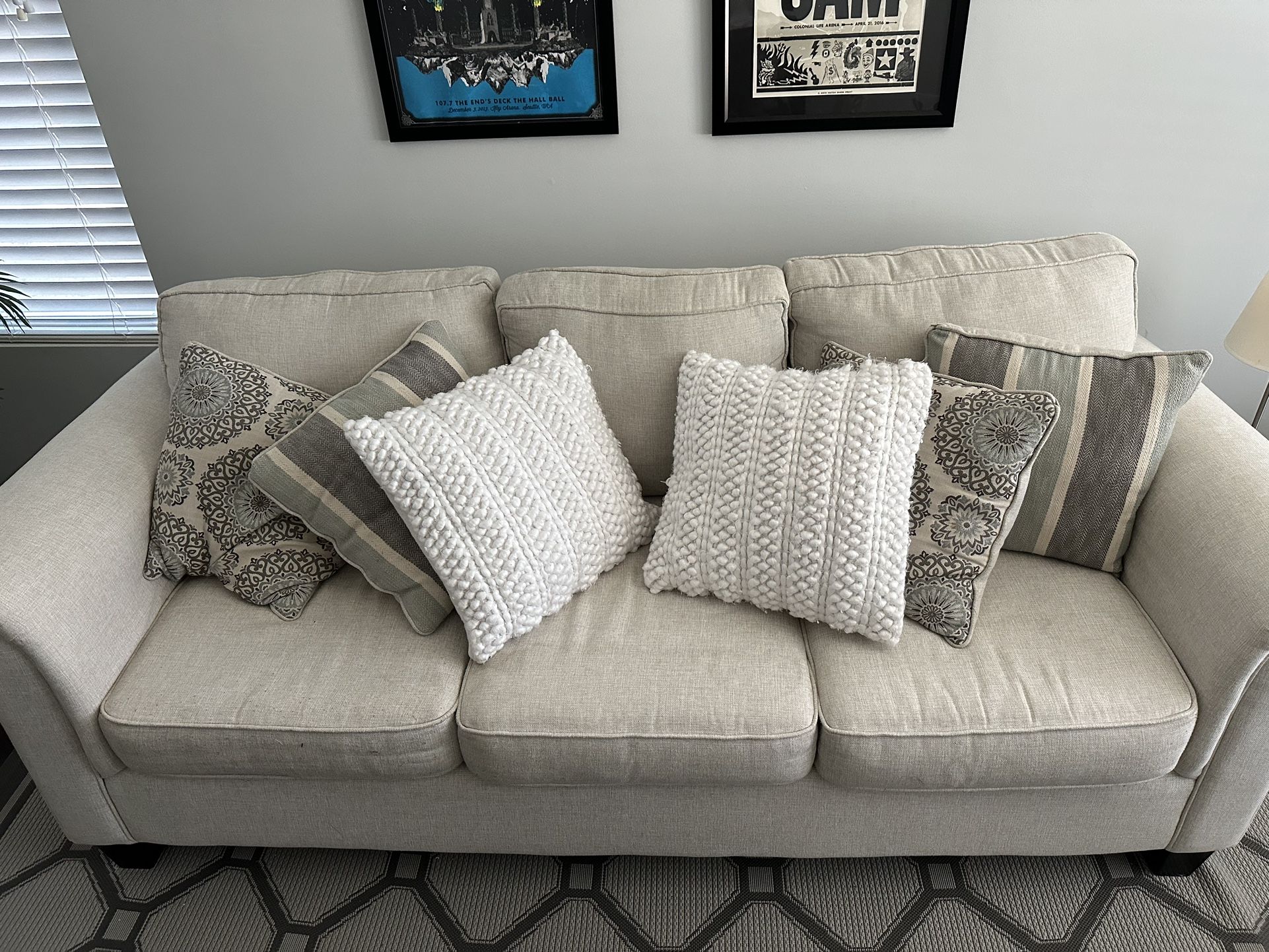 8ft (7.5) Tan couch with Pillows